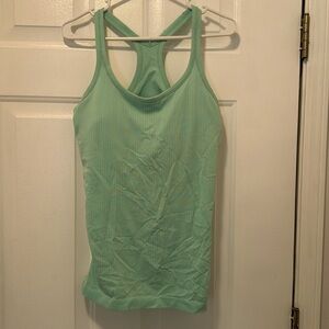 Lulu Lemon Tank with boob pads. Worn once.